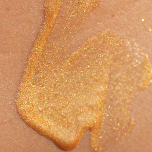 Molten gold shimmer drops with body brush
