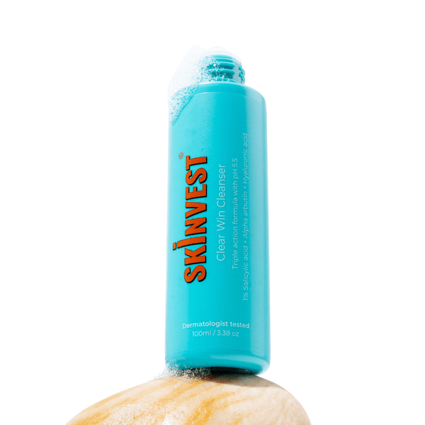 Skinvest clear skin cleanser bottle on a white background