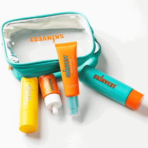 Skinvest Glow on the Go travel pouch with skincare minis