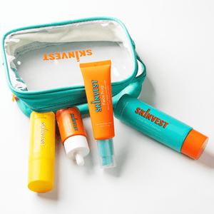 Skinvest Glow on the Go travel pouch with skincare minis